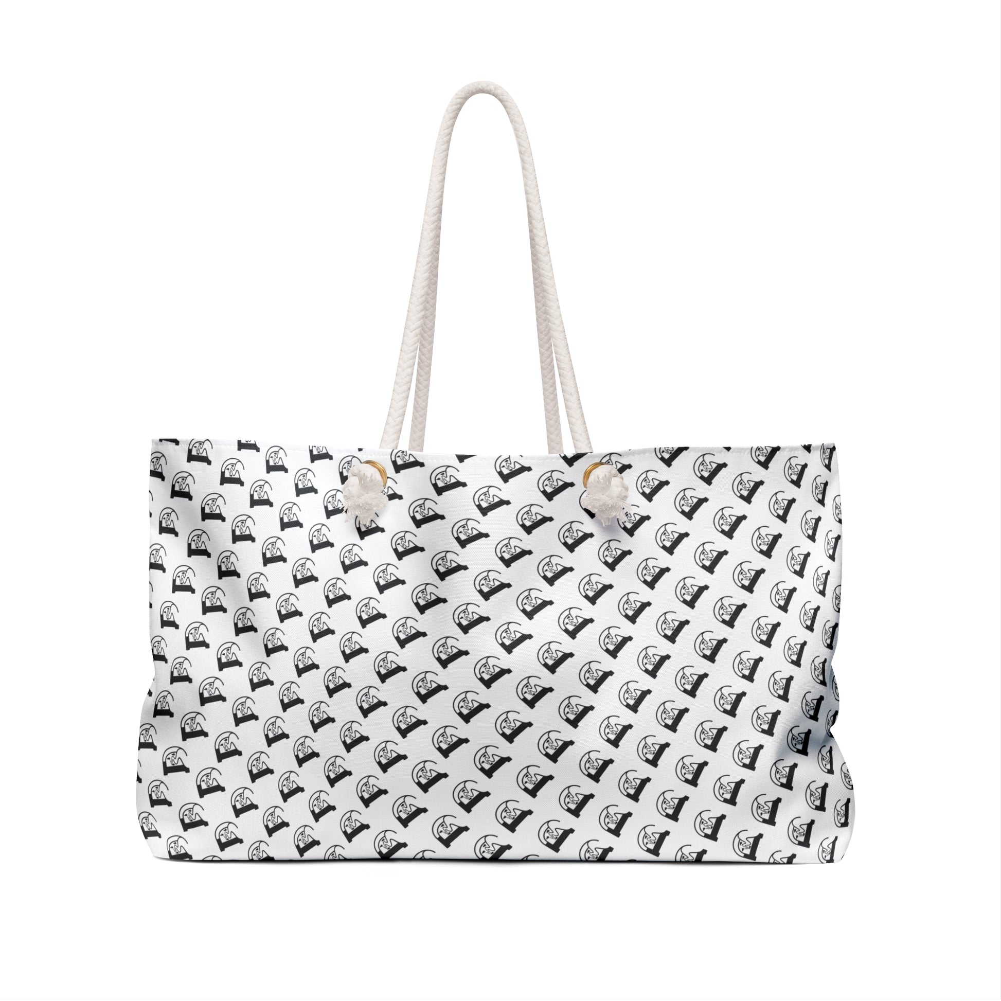 Designed for The Wild Co weekender bag, spacious fabric bag with leather accents, suitable for short trips and travel.
