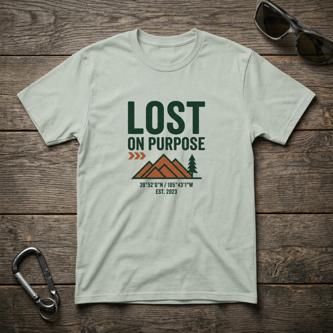 Lost on Purpose garment-dyed graphic T-shirt by Designed For The Wild Co featuring a casual fit and artistic print.