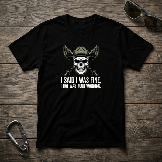 Black I Said I Was Fine graphic T-shirt by Designed For The Wild Co, showing a comfortable garment-dyed cotton tee with printed design.