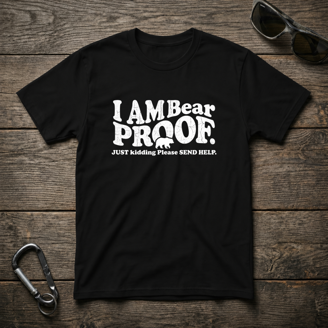 Black I'm Bear Proof graphic T-shirt by Designed For The Wild Co featuring a bold bear illustration on soft cotton fabric.