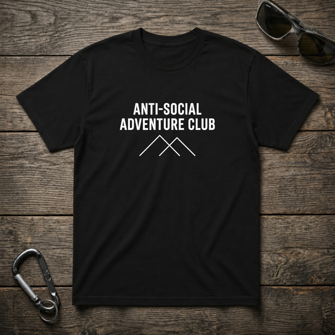Black graphic T-shirt by Designed For The Wild Co with anti-social adventure club logo and bold design.