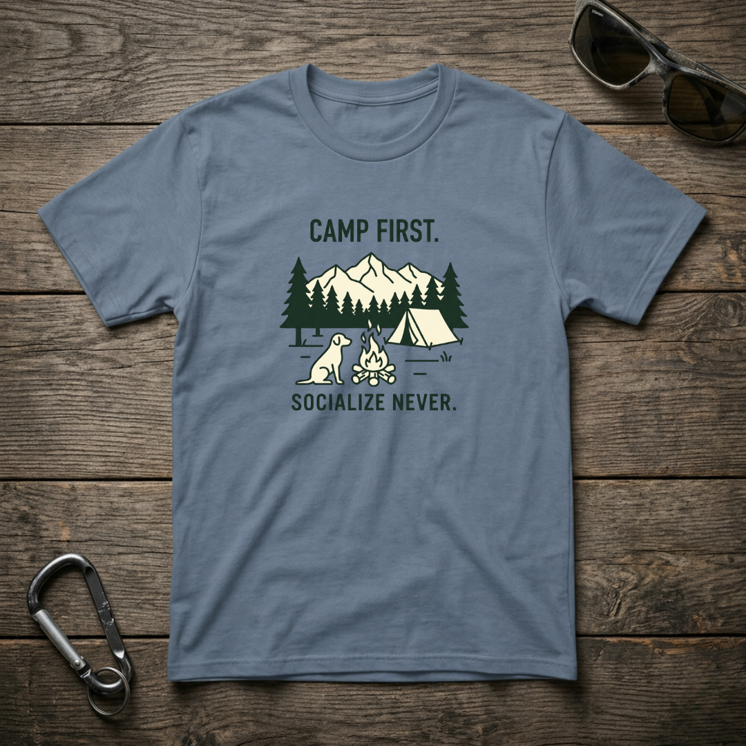 Blue graphic T-shirt from Designed For The Wild Co's Camp First, Socialize Never collection, featuring a casual, garment-dyed design.