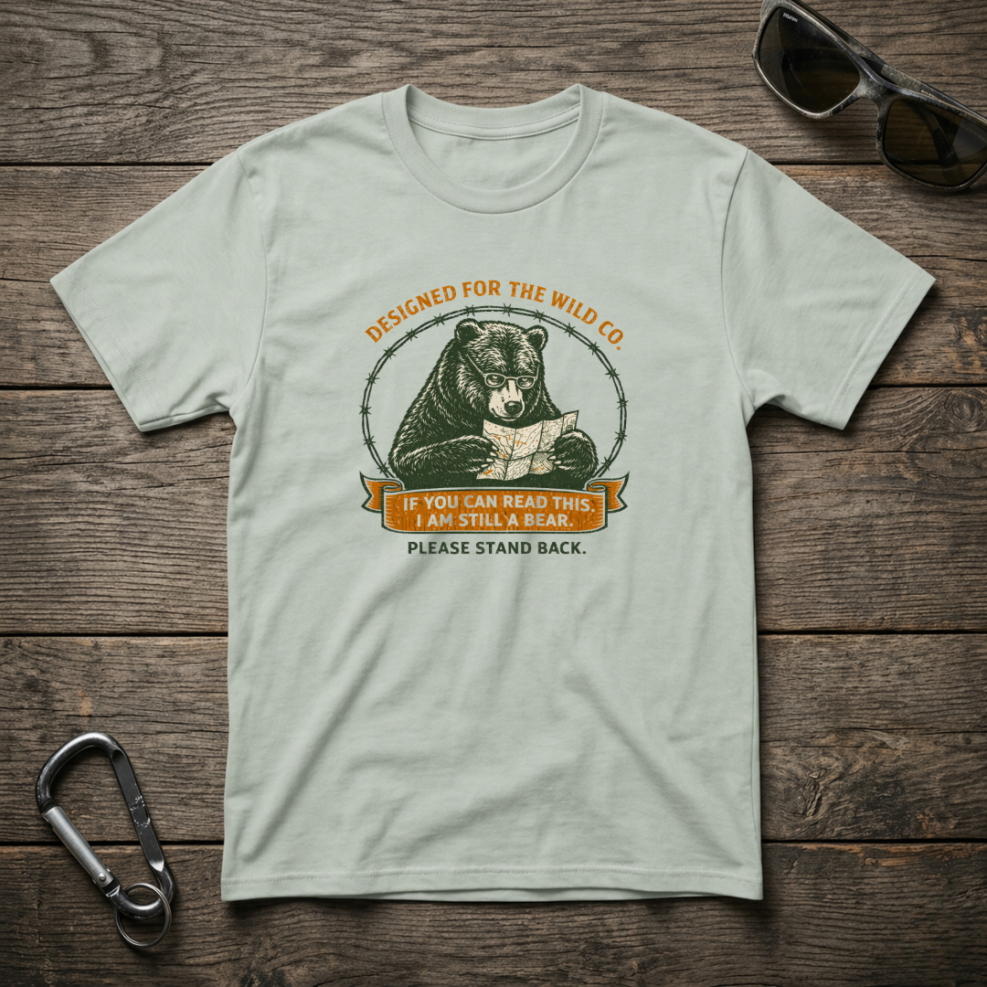 Graphic T-shirt by Designed For The Wild Co featuring a bear design on a garment-dyed fabric, casual and comfortable.