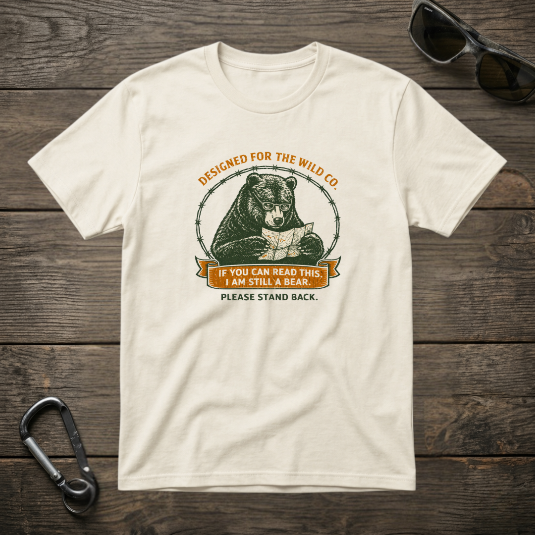 Graphic ivory T-shirt from Designed For The Wild Co featuring “I Am Still A Bear” design, garment-dyed for a soft, vintage look.