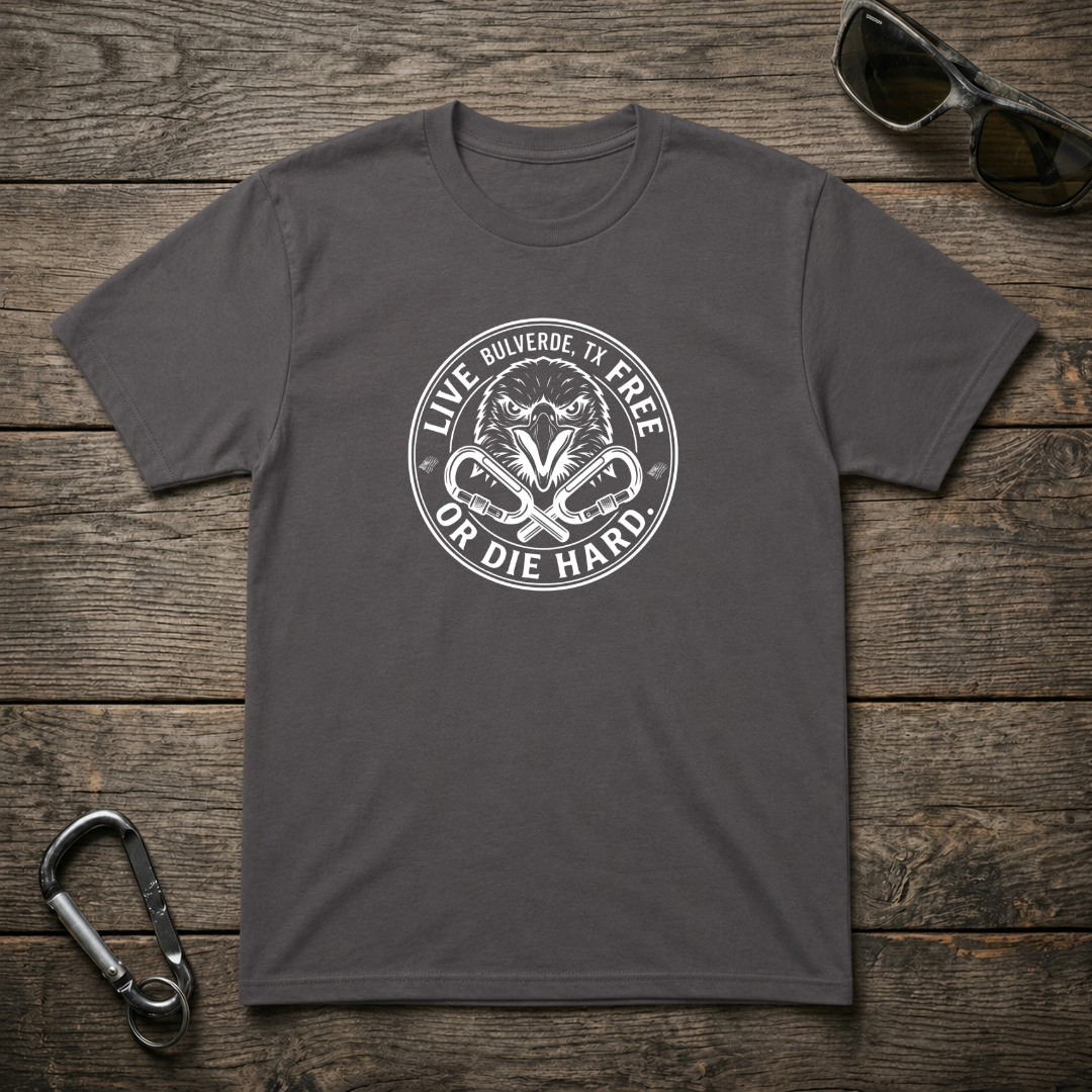 Charcoal heavyweight graphic T-shirt from Designed For The Wild Co featuring "Live Free Or Die Hard" text and bold design.