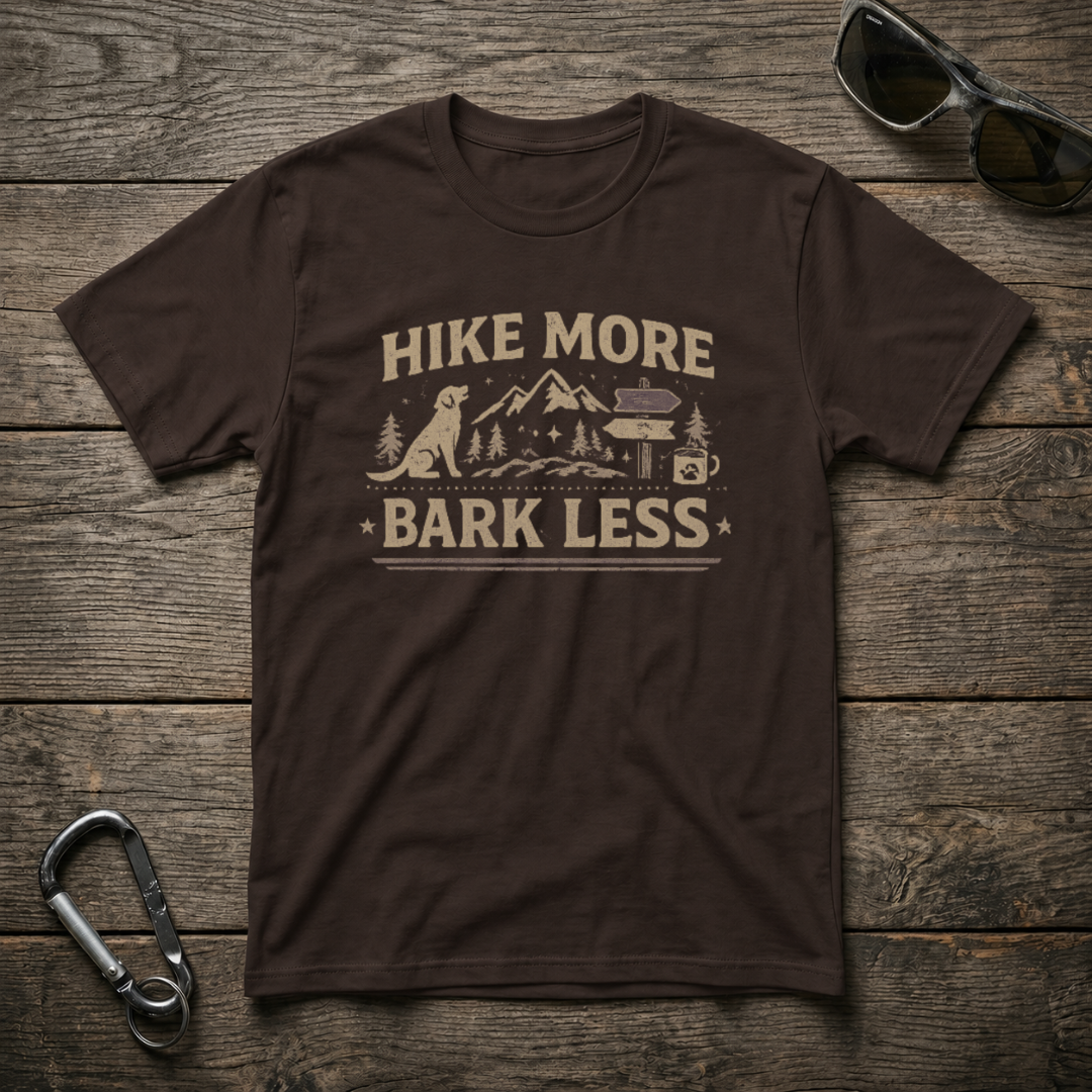 Dark chocolate graphic T-shirt by Designed For The Wild Co featuring "Hike More, Bark Less" design on a softstyle fabric.