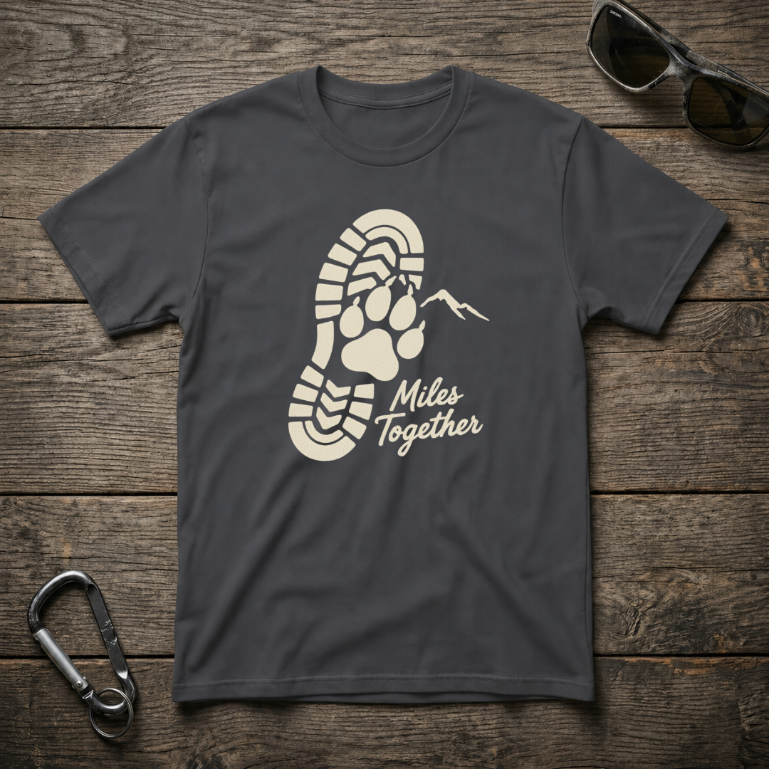 Dark heather Miles Together Paw Softstyle Graphic T-Shirt by Designed For The Wild Co featuring a paw print design.
