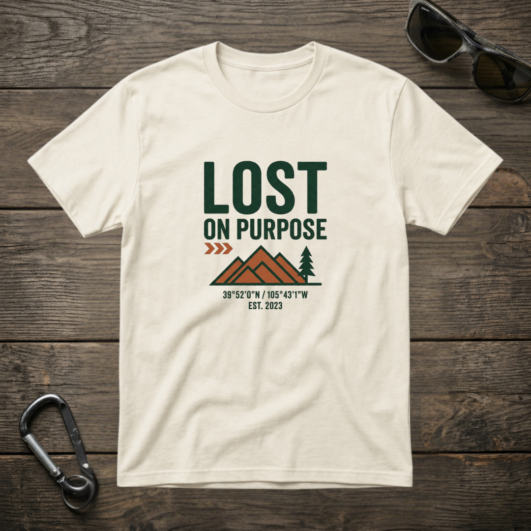 Lost on Purpose graphic T-shirt by Designed For The Wild Co, ivory garment-dyed cotton shirt with casual fit and artistic print.