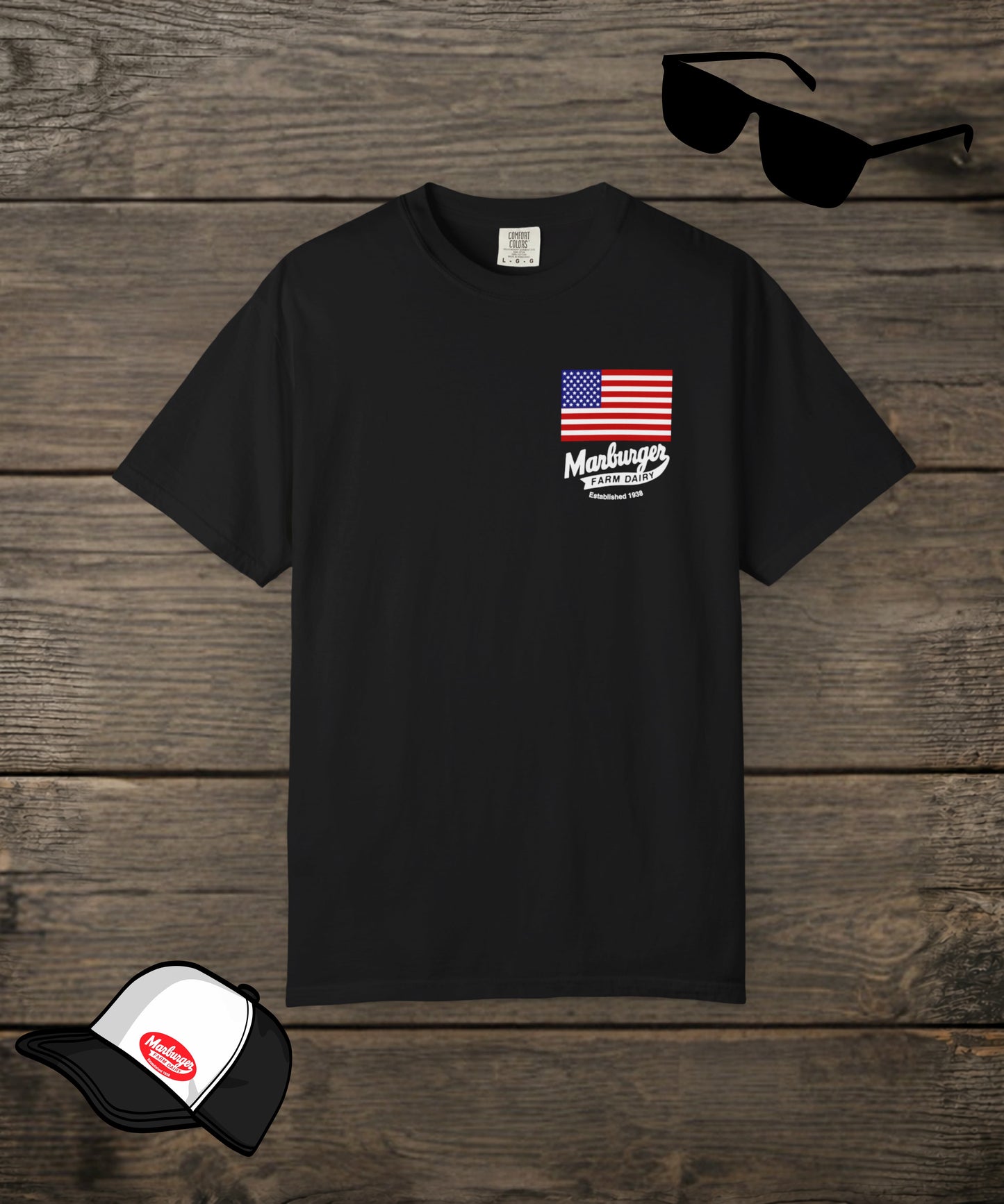 Black Comfort Colors custom T-shirt by Designed For The Wild Co featuring Marburger Farm Dairy Co. logo on the front.