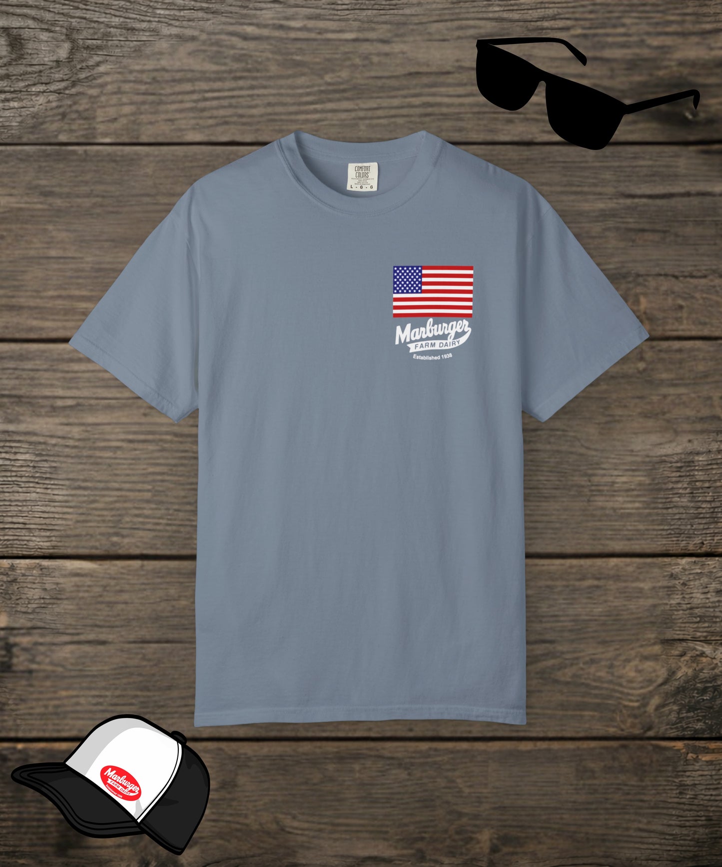 Marburger Farm Dairy Co. Comfort Colors custom T-shirt in blue with front logo design, made by Designed For The Wild Co.