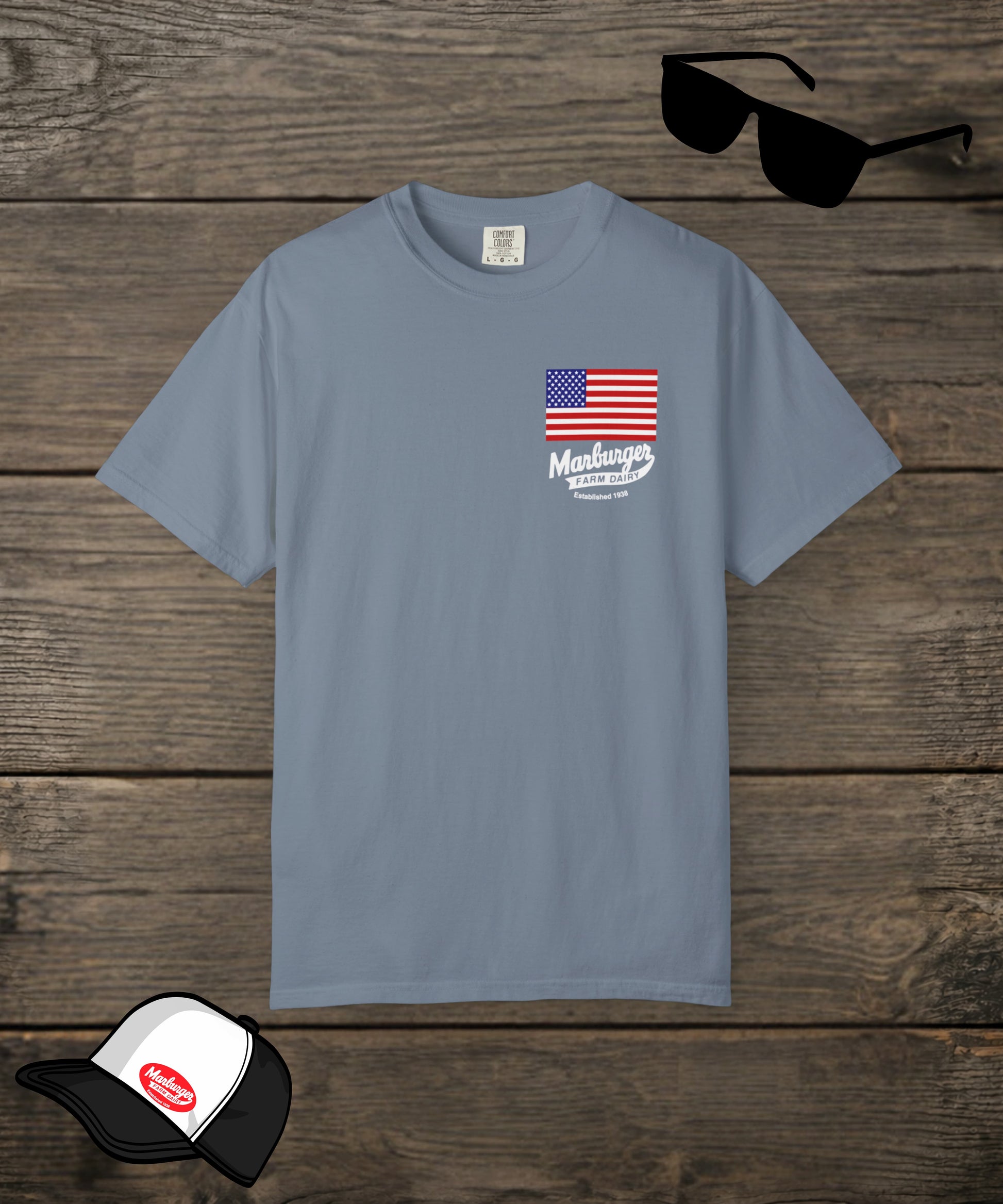 Marburger Farm Dairy Co. Comfort Colors custom T-shirt in blue with front logo design, made by Designed For The Wild Co.
