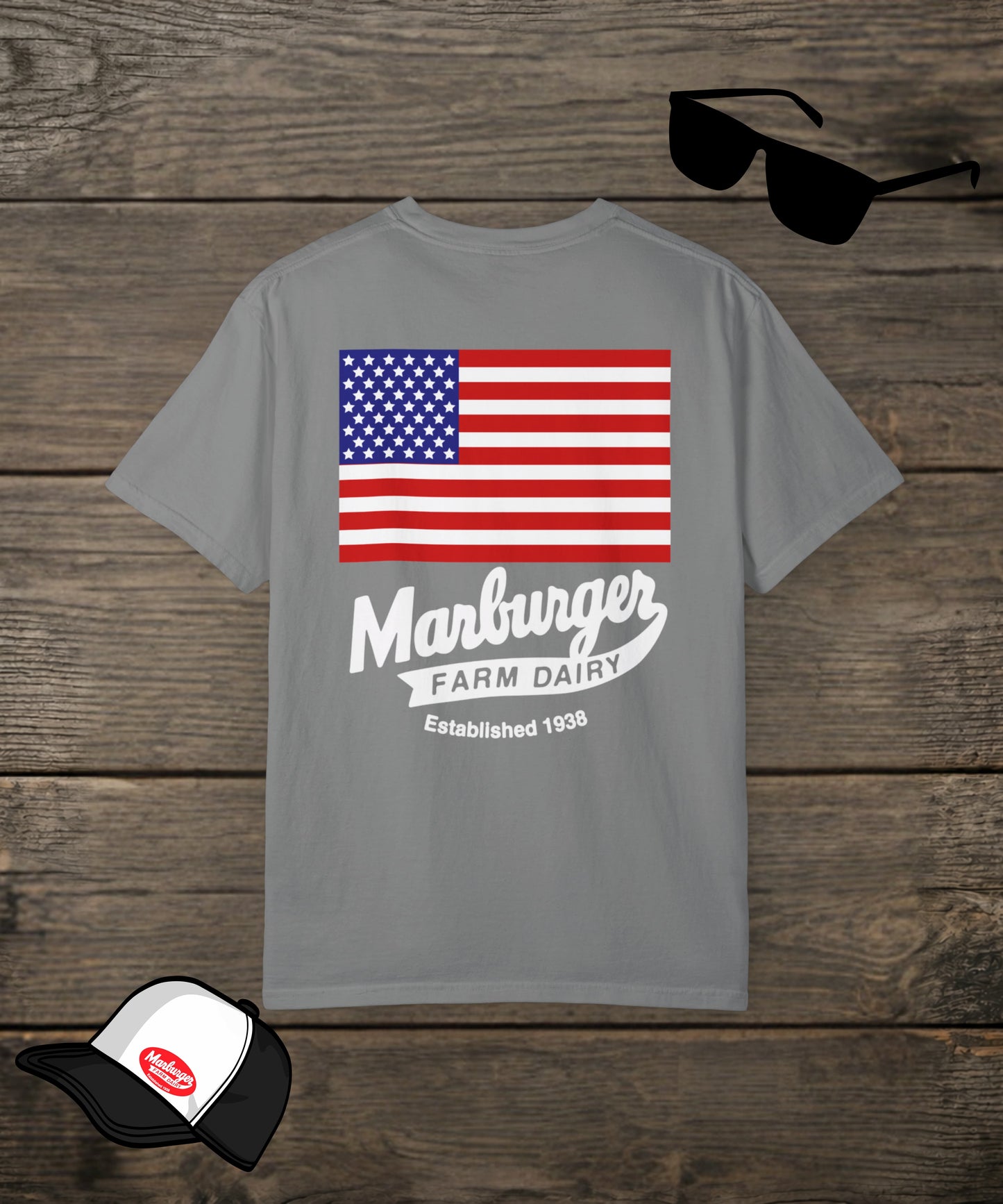 Custom grey T-shirt from Designed For The Wild Co featuring Marburger Farm Dairy Co. branding on the back.