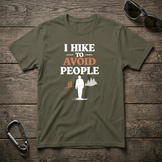 Military green I Hike to Avoid People graphic T-shirt by Designed For The Wild Co, casual softstyle tee with outdoor-themed design.