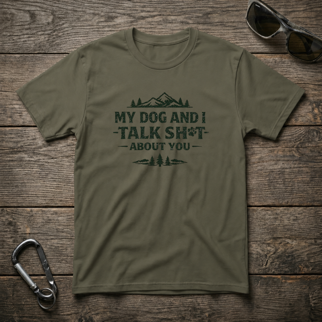 Military green graphic T-shirt by Designed For The Wild Co featuring bold text that reads "My Dog and I Talk Sh*t".