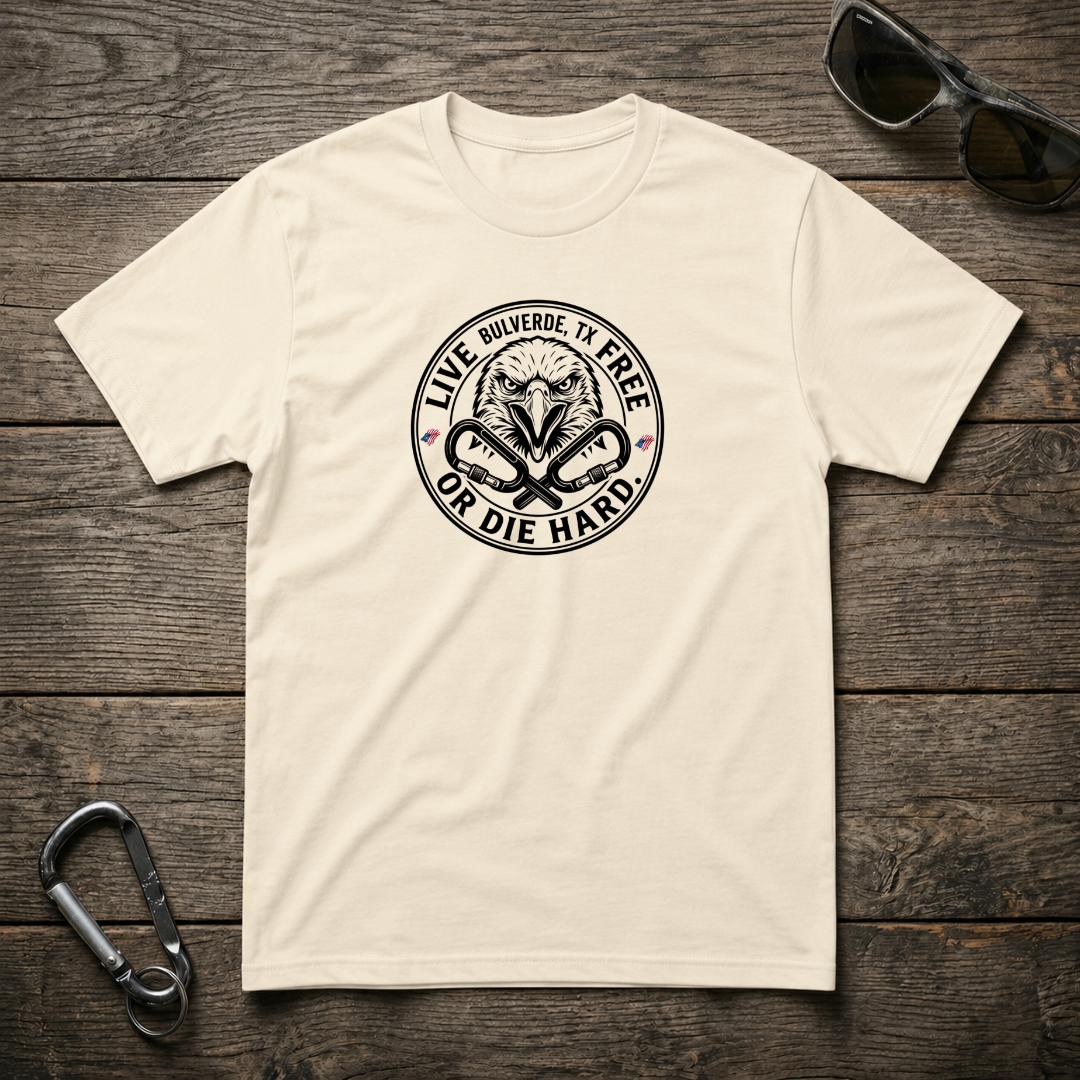Graphic T-Shirt displaying "Live Free Or Die Hard" design from Designed For The Wild Co, featuring bold text on a heavyweight tee.