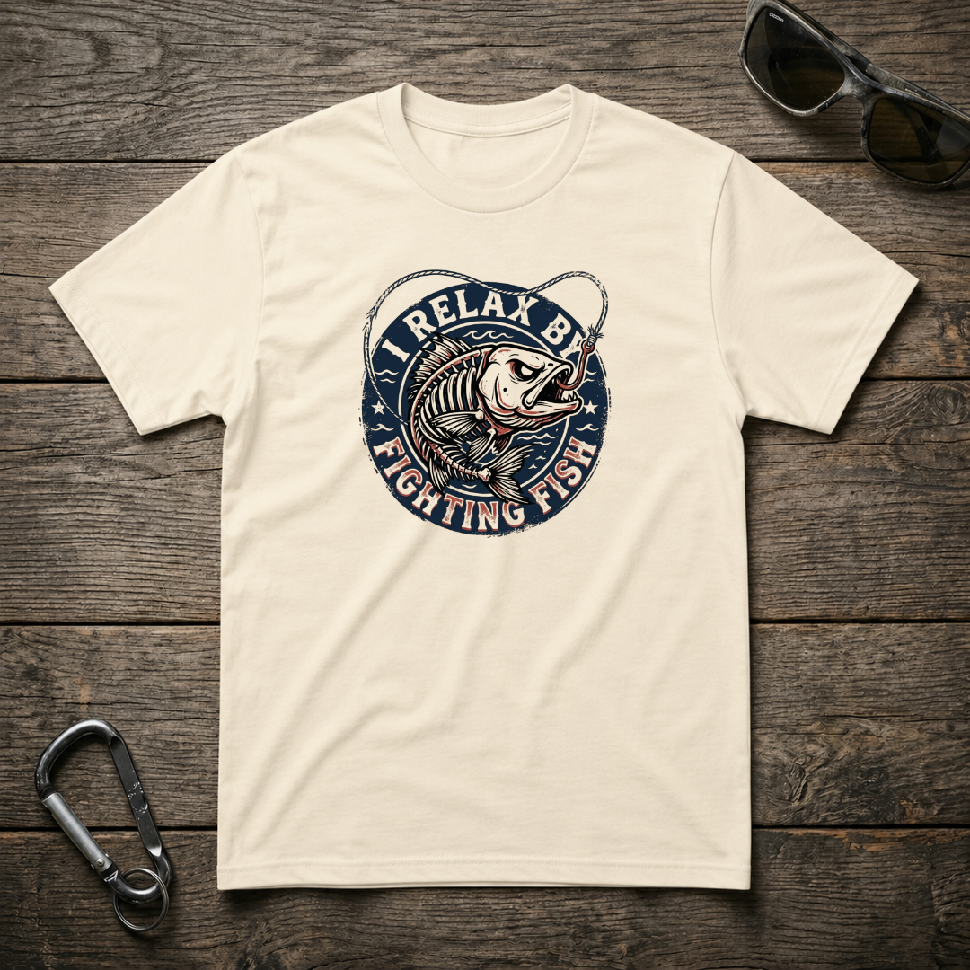 I Relax By Fighting Fish heavyweight graphic T-shirt by Designed For The Wild Co showing a bold fish illustration on soft fabric.