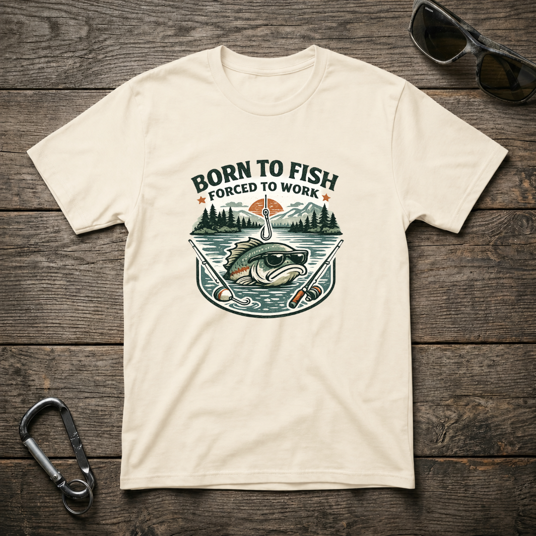 Born to Fish, Forced to Work graphic softstyle T-shirt by Designed For The Wild Co, featuring a fishing-themed design on a comfortable T-shirt.