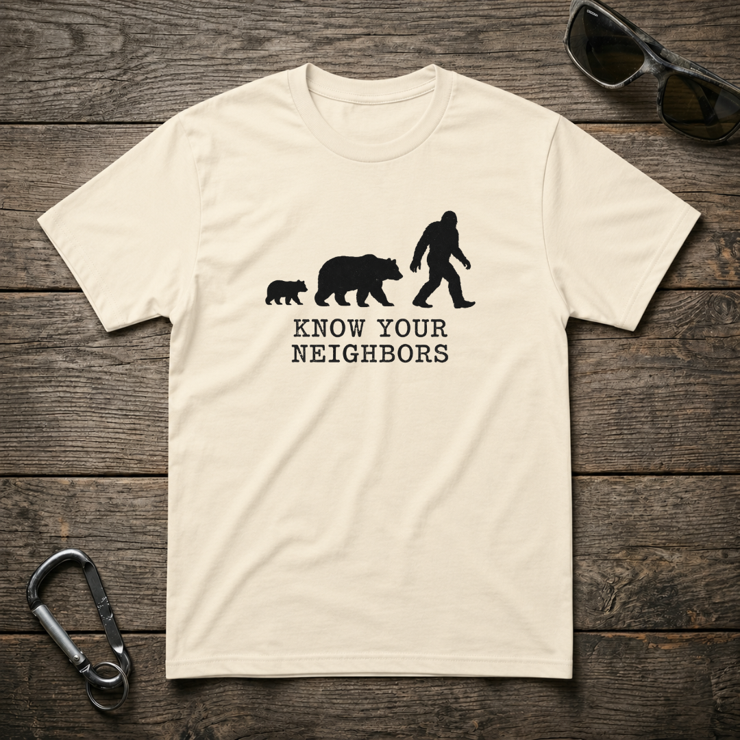 Designed For The Wild Co heavyweight graphic T-shirt featuring a bold "Know Your Neighbors" design on soft fabric.