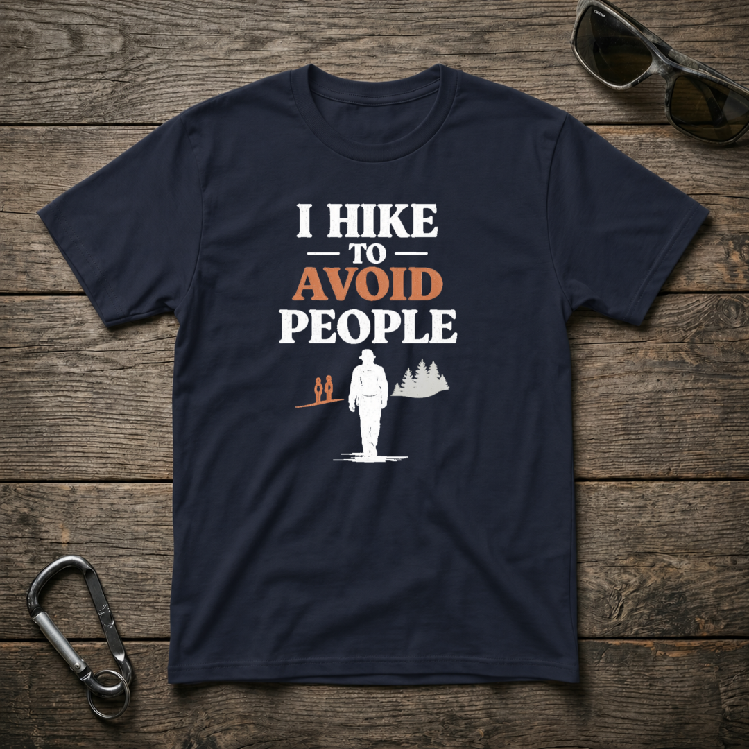 Navy graphic T-shirt by Designed For The Wild Co with "I Hike to Avoid People" slogan and nature-themed design.
