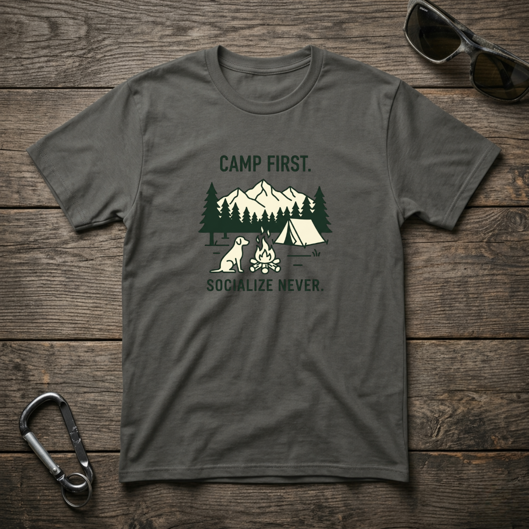 Designed For The Wild Co Camp First Socialize Never graphic T-shirt in pepper color, featuring a casual, garment-dyed cotton fabric.