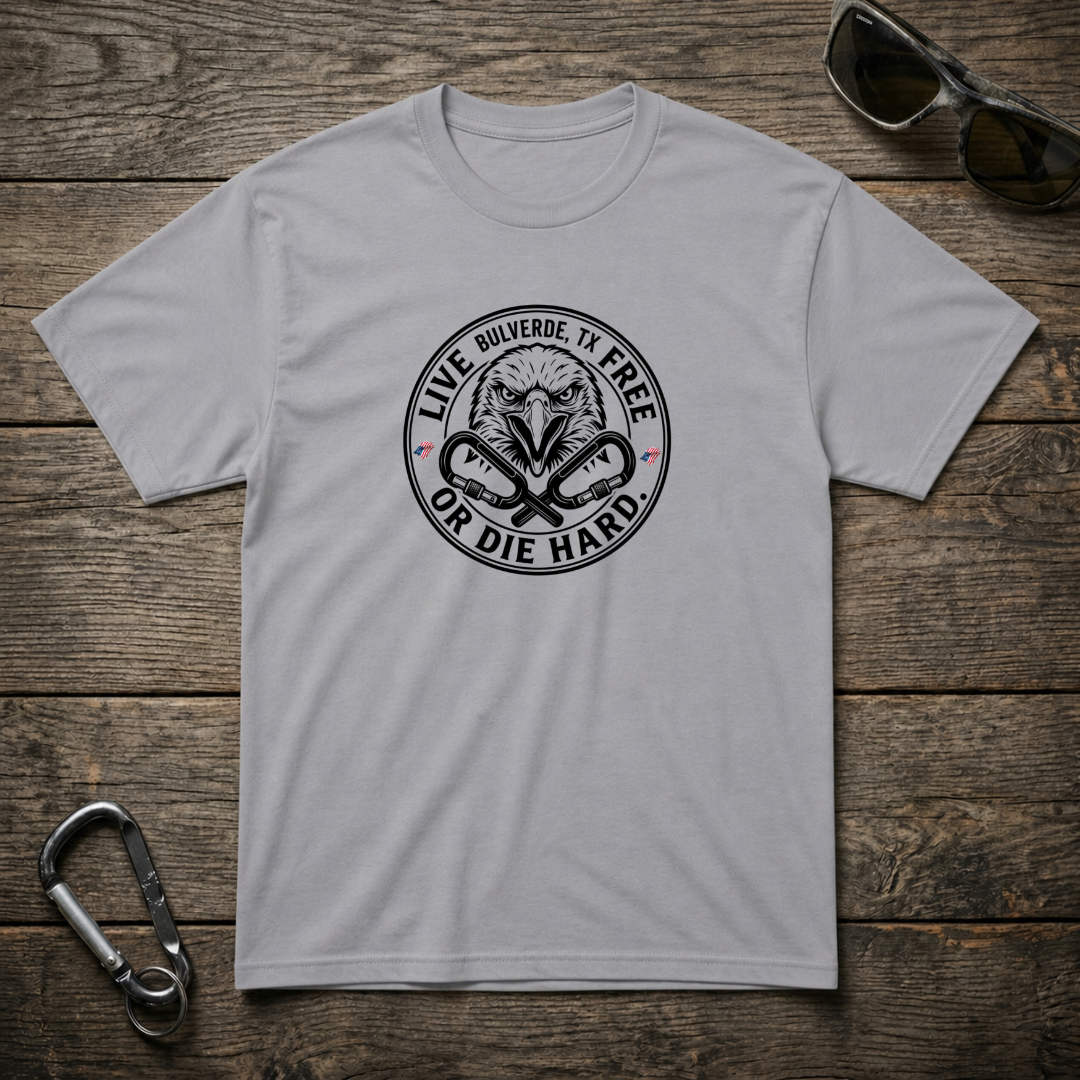 Gray graphic T-shirt from Designed For The Wild Co featuring "Live Free Or Die Hard" design on the front.