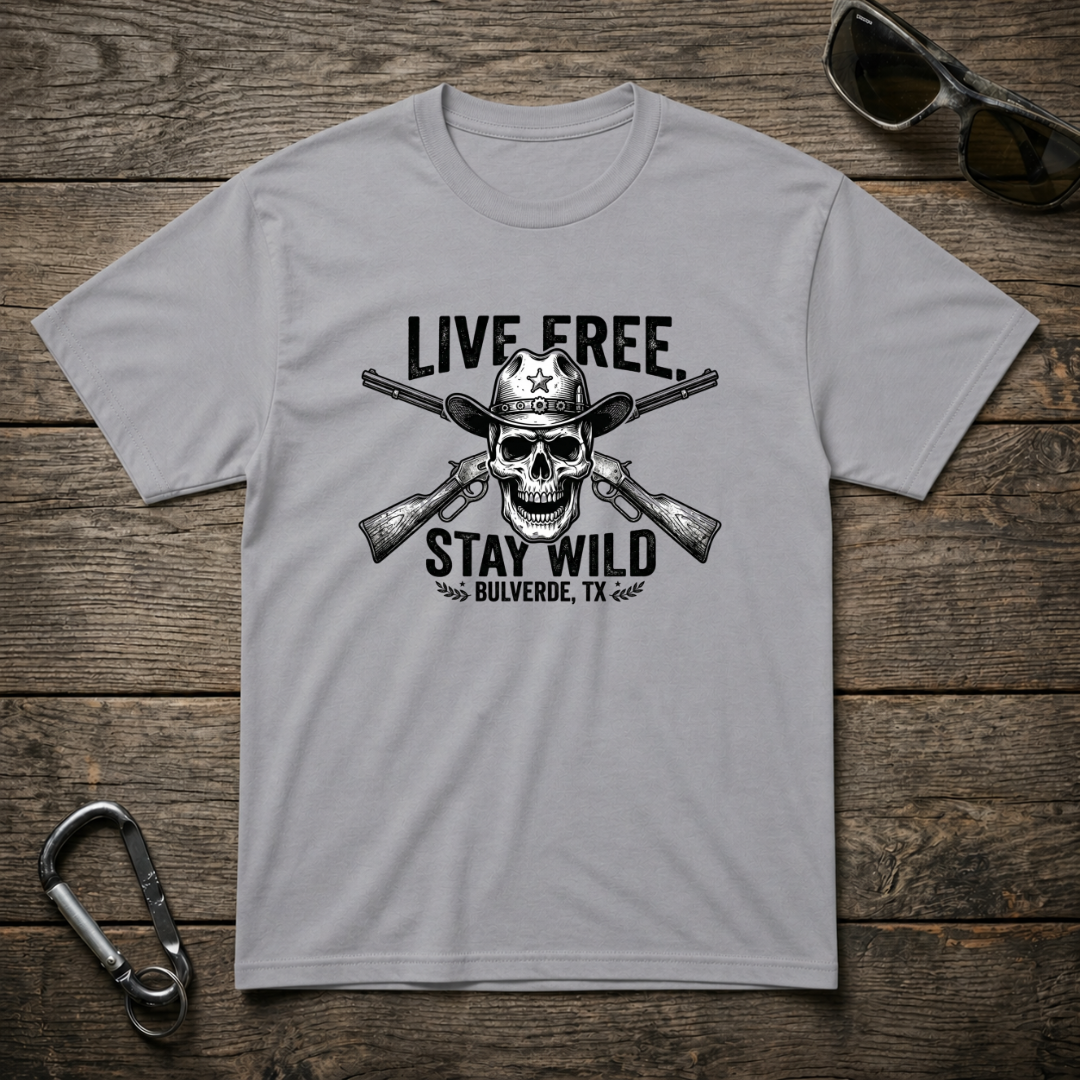 Gray heavyweight graphic T-shirt from Designed For The Wild Co featuring "Live Free Stay Wild" design on front.