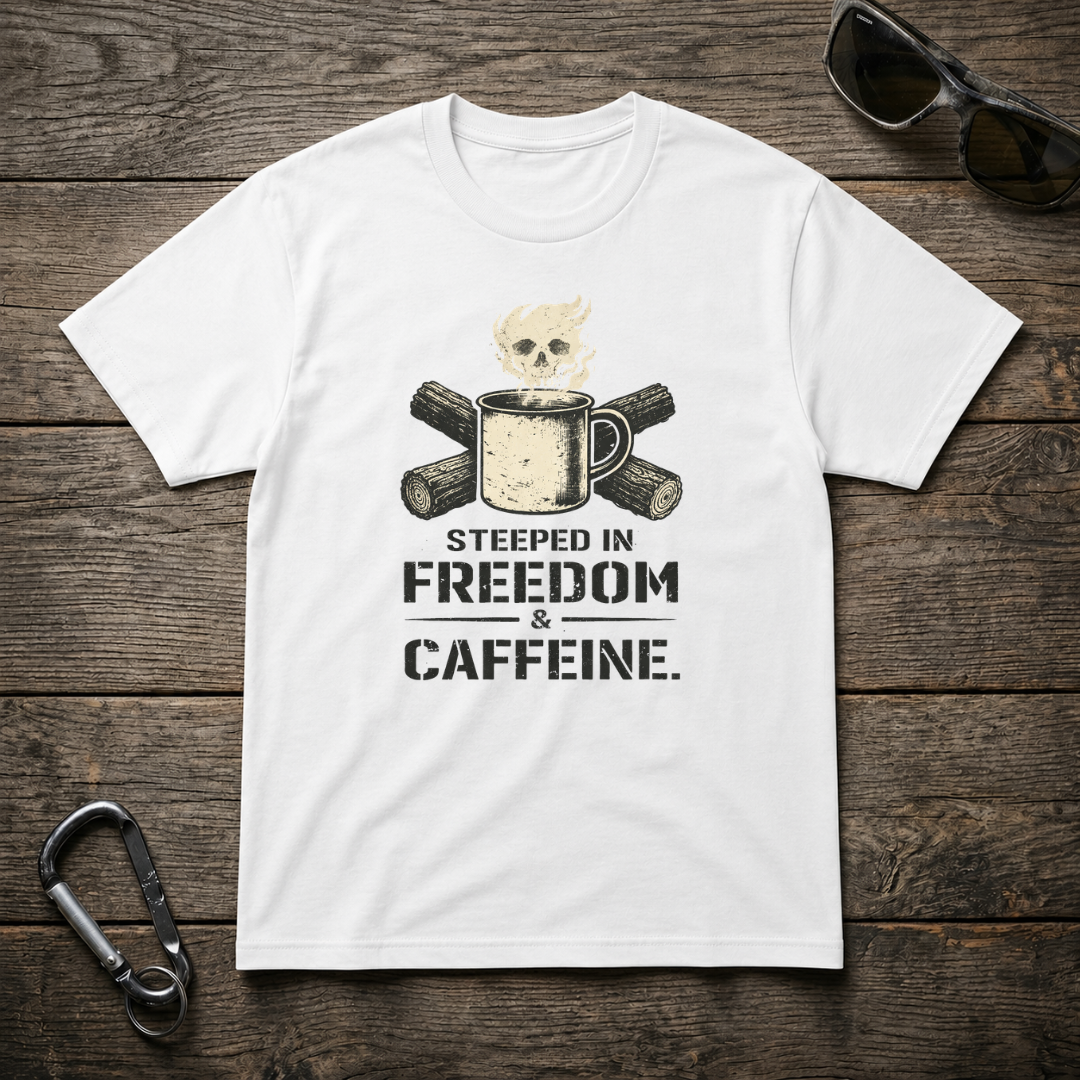 White graphic T-shirt featuring "Steeped In Freedom & Caffeine" design by Designed For The Wild Co, casual and stylish for everyday wear.