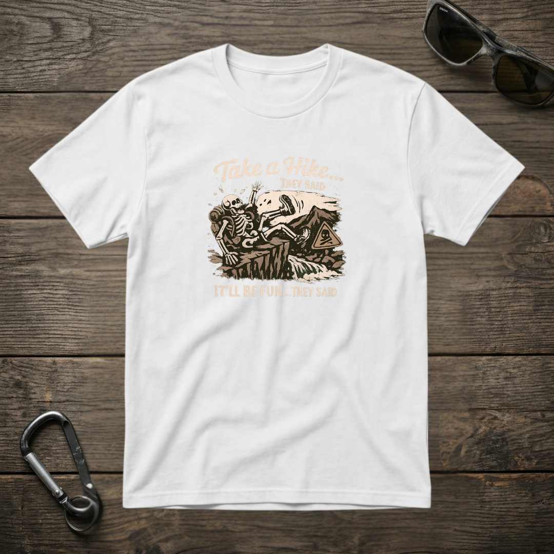 White graphic T-shirt by Designed For The Wild Co with "Take a Hike They Said" print, casual and comfortable for outdoor adventures.