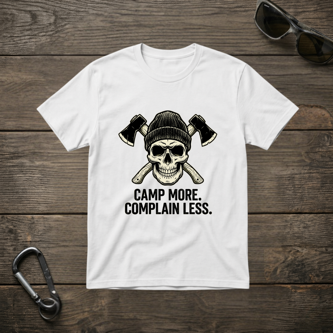 White graphic T-shirt by Designed For The Wild Co with "Camp More, Complain Less" slogan, garment-dyed for a soft finish.